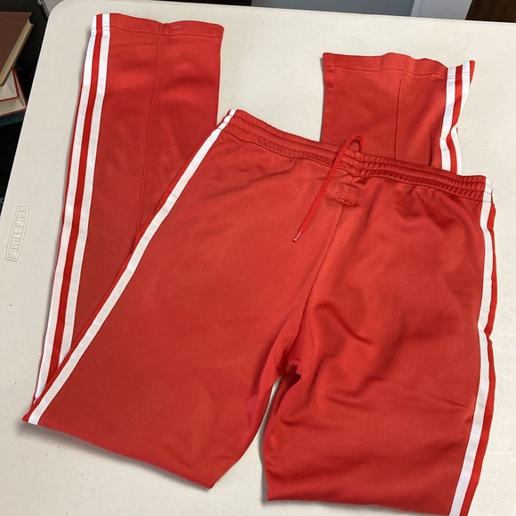 Vintage Adidas Track Pants women's size Small
Zip Leg Elastic drawstring waist - Picture 2 of 13